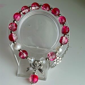 Hot pink glass bead double charm bracelet